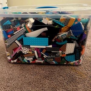 Lego set with 90 ish Legos sets of different legos from different stores